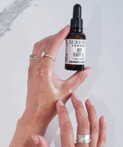 organic beauty oil using on hands
