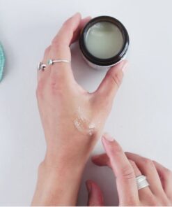 organic cleansing balm on hands
