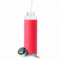 glass water bottle coral pink water pouring