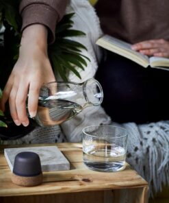 black+blum eau carafe with charcoal filter pouring